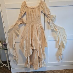 Elegant Cream Maxi Dress with Dramatic Sleeves